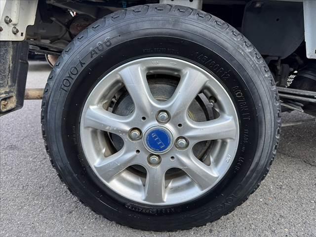 アクティトラック SDX 5速ミッション 車検整備付 リモコンキー マニュアルエアコン パワーウィンドウ パワードアロック 三方開荷台 ガードパイプ付トリイ 荷台作業灯 FMラジオ 社外12AW シガー ETC エアバッグ(38枚目)