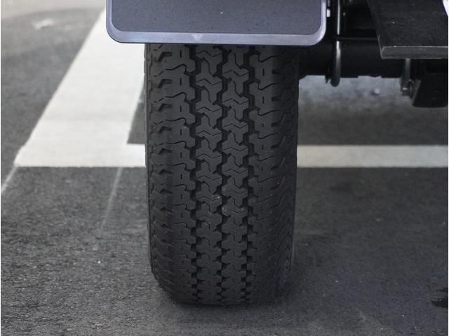 キャリイトラック KCエアコン・パワステ農繁 4WD オートマ 荷台作業灯 4WD オートマ リアパーキングセンサー 荷台作業灯 3方開 キーレスエントリー AMFMラジオ オートライト 衝突被害軽減システム アイドリングストップ 横滑り防止機能 衝突安全ボディ(27枚目)