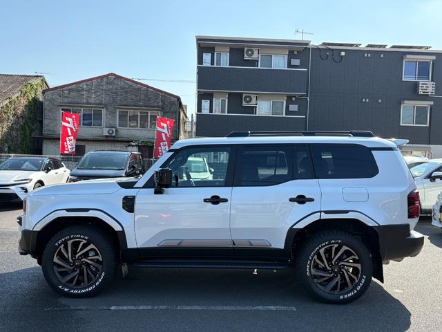 ランドクルーザー２５０ ＶＸ　モデリスタパーツ（フロントバンパーガード／フロントアンダーカバー／リアバンパーガーニッシュ／シグネチャーイルミ／オーバーフェンダー／２０インチＡＷ／インテリアイルミほか）／サンルーフ／黒レザー（7枚目）