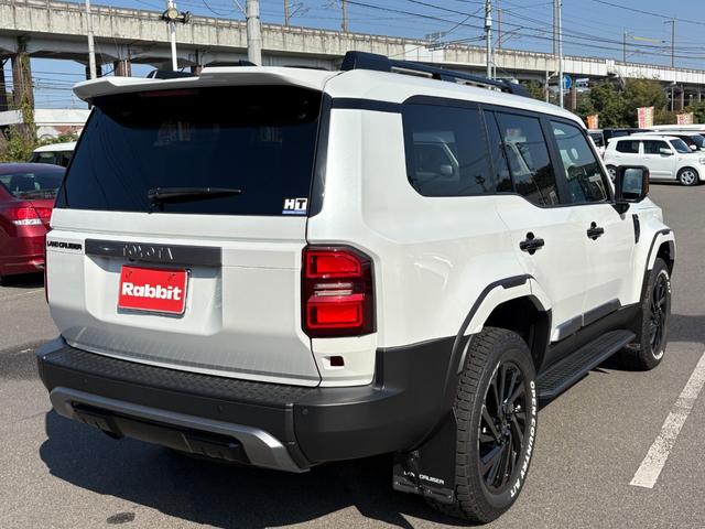 ランドクルーザー２５０ ＶＸ　モデリスタパーツ（フロントバンパーガード／フロントアンダーカバー／リアバンパーガーニッシュ／シグネチャーイルミ／オーバーフェンダー／２０インチＡＷ／インテリアイルミほか）／サンルーフ／黒レザー（9枚目）