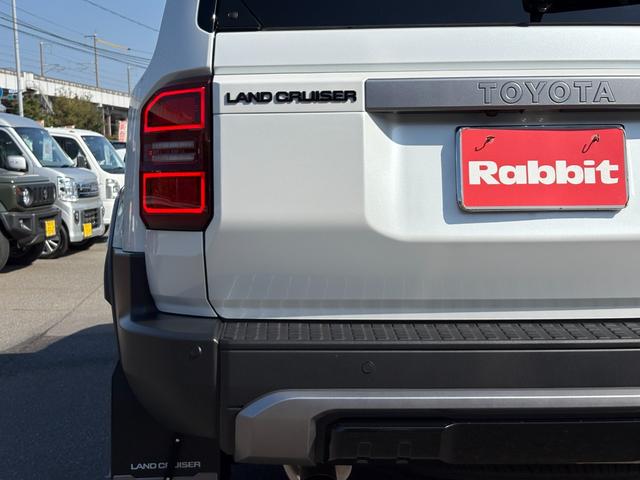 ランドクルーザー２５０ ＶＸ　モデリスタパーツ（フロントバンパーガード／フロントアンダーカバー／リアバンパーガーニッシュ／シグネチャーイルミ／オーバーフェンダー／２０インチＡＷ／インテリアイルミほか）／サンルーフ／黒レザー（15枚目）