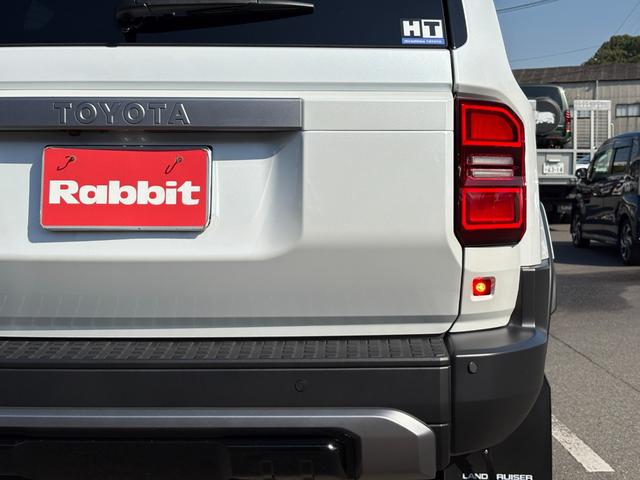 ランドクルーザー２５０ ＶＸ　モデリスタパーツ（フロントバンパーガード／フロントアンダーカバー／リアバンパーガーニッシュ／シグネチャーイルミ／オーバーフェンダー／２０インチＡＷ／インテリアイルミほか）／サンルーフ／黒レザー（16枚目）