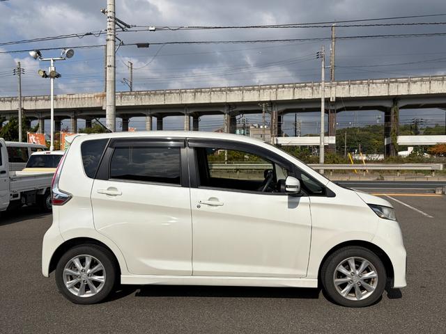 eKカスタム G ワンオーナー/7インチメモリーナビ/フルセグ/バックカメラ/Bluetooth&USB接続/CD&SD&DVD再生/Mサーバー/HIDヘッドライト/運転席シートヒーター/アイドリングストップ(10枚目)