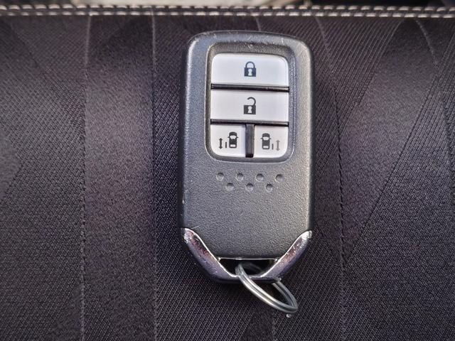 オデッセイ アブソルート・ＥＸホンダセンシング　ギャザーズ９インチメモリーナビ・後席用９インチフリップダウンモニター／全方位カメラ／リヤエンターテインメント／Ｂｌｕｅｔｏｏｔｈ＆ＨＤＭＩ接続／２．０ＥＴＣ／スマートキー２本／両側電動スライドドア（53枚目）