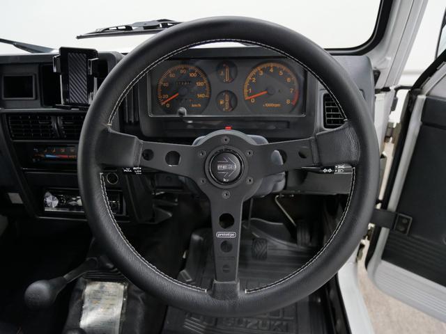 ジムニー CC 後付けパワーステアリング(純正流用) 純正オプションフォグライト 防錆施工済み(ノックスドール) BesTop幌 モモステアリング シートカバー 1型グリル JA11V用アルミホイール Tベルト交換済(19枚目)