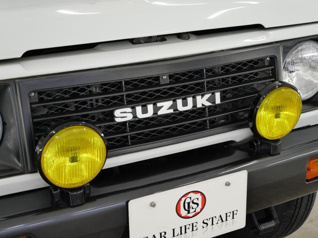 ジムニー CC 後付けパワーステアリング(純正流用) 純正オプションフォグライト 防錆施工済み(ノックスドール) BesTop幌 モモステアリング シートカバー 1型グリル JA11V用アルミホイール Tベルト交換済(39枚目)