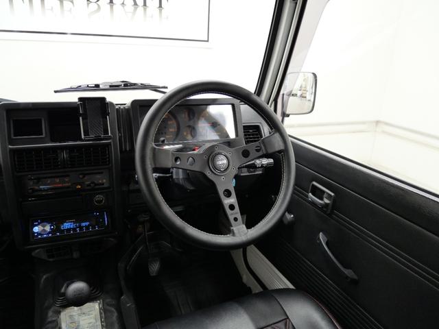 ジムニー CC 後付けパワーステアリング(純正流用) 純正オプションフォグライト 防錆施工済み(ノックスドール) BesTop幌 モモステアリング シートカバー 1型グリル JA11V用アルミホイール Tベルト交換済(53枚目)