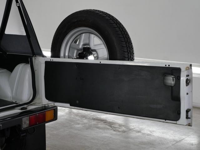 ジムニー CC 後付けパワーステアリング(純正流用) 純正オプションフォグライト 防錆施工済み(ノックスドール) BesTop幌 モモステアリング シートカバー 1型グリル JA11V用アルミホイール Tベルト交換済(73枚目)