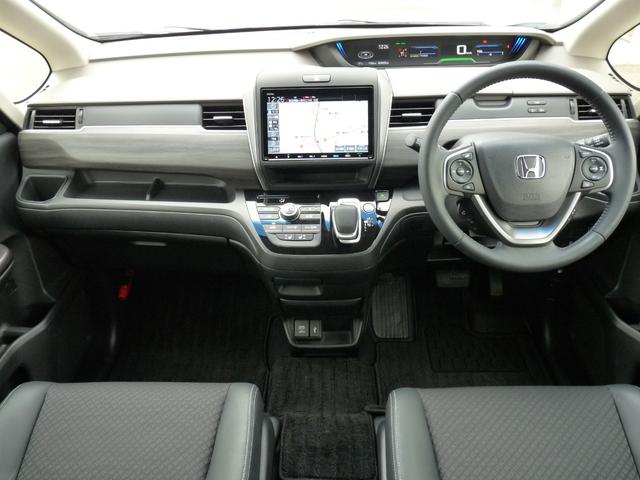 フリードハイブリッド ハイブリッド・Gホンダセンシング ・ワンオーナー ・禁煙 ・6人乗りシート ・純正9インチナビ ・リアカメラ ・ETC ・ホンダセンシング ・両側電動スライドドア ・フロントグリル ・LEDフォグライト ・ドアバイザー ・1年保証(2枚目)