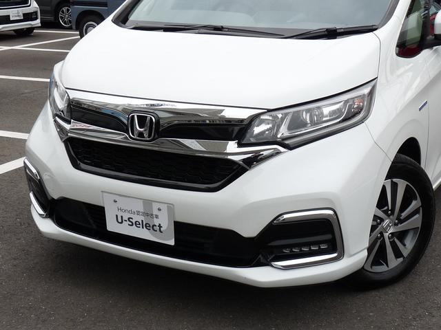 フリードハイブリッド ハイブリッド・Gホンダセンシング ・ワンオーナー ・禁煙 ・6人乗りシート ・純正9インチナビ ・リアカメラ ・ETC ・ホンダセンシング ・両側電動スライドドア ・フロントグリル ・LEDフォグライト ・ドアバイザー ・1年保証(9枚目)