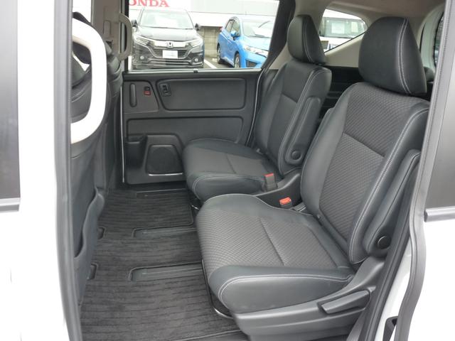 フリードハイブリッド ハイブリッド・Gホンダセンシング ・ワンオーナー ・禁煙 ・6人乗りシート ・純正9インチナビ ・リアカメラ ・ETC ・ホンダセンシング ・両側電動スライドドア ・フロントグリル ・LEDフォグライト ・ドアバイザー ・1年保証(14枚目)