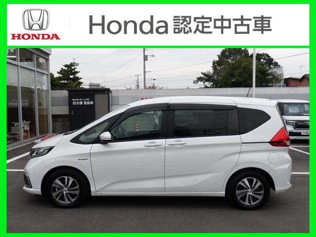 フリードハイブリッド ハイブリッド・Gホンダセンシング ・ワンオーナー ・禁煙 ・6人乗りシート ・純正9インチナビ ・リアカメラ ・ETC ・ホンダセンシング ・両側電動スライドドア ・フロントグリル ・LEDフォグライト ・ドアバイザー ・1年保証(15枚目)