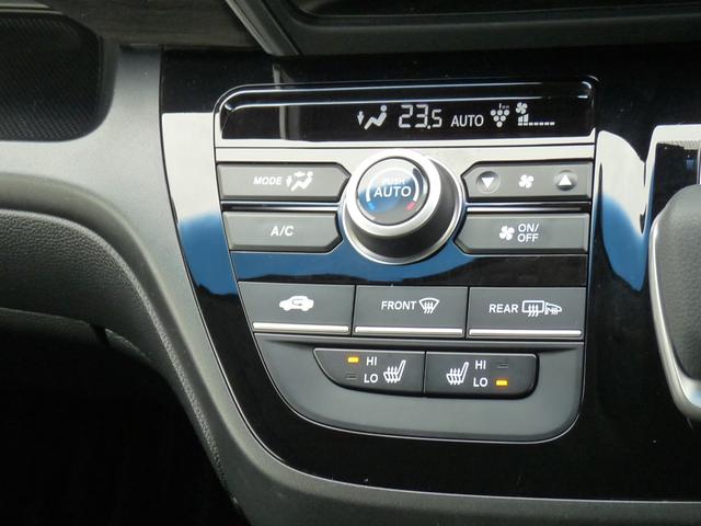 フリードハイブリッド ハイブリッド・Gホンダセンシング ・ワンオーナー ・禁煙 ・6人乗りシート ・純正9インチナビ ・リアカメラ ・ETC ・ホンダセンシング ・両側電動スライドドア ・フロントグリル ・LEDフォグライト ・ドアバイザー ・1年保証(18枚目)