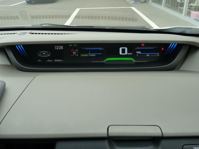 フリードハイブリッド ハイブリッド・Gホンダセンシング ・ワンオーナー ・禁煙 ・6人乗りシート ・純正9インチナビ ・リアカメラ ・ETC ・ホンダセンシング ・両側電動スライドドア ・フロントグリル ・LEDフォグライト ・ドアバイザー ・1年保証(20枚目)