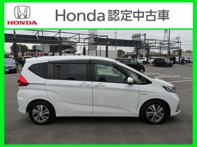 フリードハイブリッド ハイブリッド・Gホンダセンシング ・ワンオーナー ・禁煙 ・6人乗りシート ・純正9インチナビ ・リアカメラ ・ETC ・ホンダセンシング ・両側電動スライドドア ・フロントグリル ・LEDフォグライト ・ドアバイザー ・1年保証(22枚目)