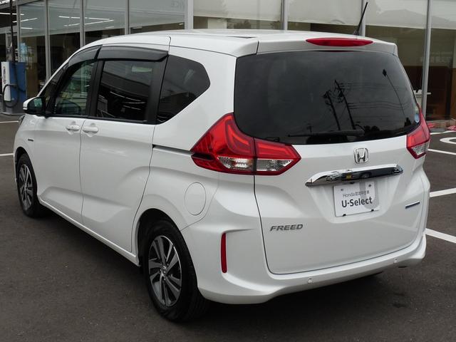 フリードハイブリッド ハイブリッド・Gホンダセンシング ・ワンオーナー ・禁煙 ・6人乗りシート ・純正9インチナビ ・リアカメラ ・ETC ・ホンダセンシング ・両側電動スライドドア ・フロントグリル ・LEDフォグライト ・ドアバイザー ・1年保証(23枚目)