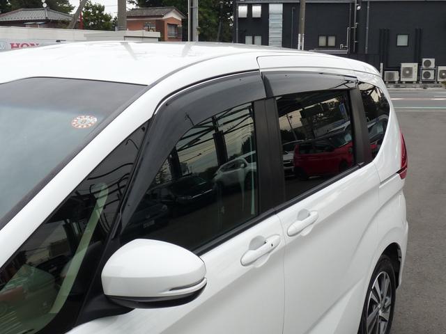 フリードハイブリッド ハイブリッド・Gホンダセンシング ・ワンオーナー ・禁煙 ・6人乗りシート ・純正9インチナビ ・リアカメラ ・ETC ・ホンダセンシング ・両側電動スライドドア ・フロントグリル ・LEDフォグライト ・ドアバイザー ・1年保証(24枚目)