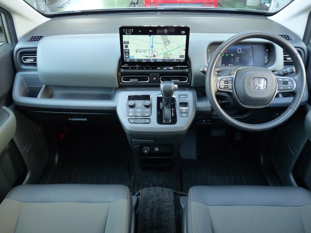 フリード e:HEVクロスター ・元試乗車 ・5人乗りシート ・純正11.4インチナビ ・リアカメラ ・ETC ・Bluetooth ・スマートキー ・ドアバイザー ・両側電動スライドドア ・ホンダセンシング ・走行1万3千キロ(2枚目)