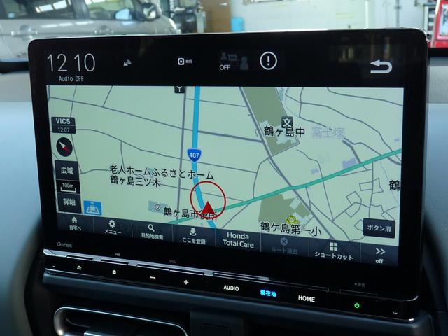 フリード e:HEVクロスター ・元試乗車 ・5人乗りシート ・純正11.4インチナビ ・リアカメラ ・ETC ・Bluetooth ・スマートキー ・ドアバイザー ・両側電動スライドドア ・ホンダセンシング ・走行1万3千キロ(5枚目)