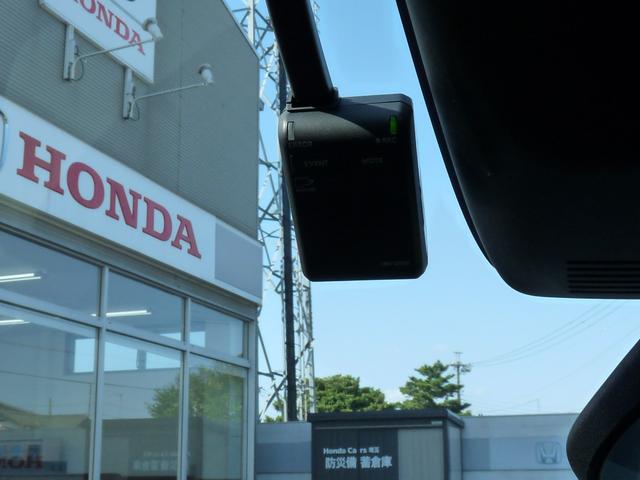 フリード e:HEVクロスター ・元試乗車 ・5人乗りシート ・純正11.4インチナビ ・リアカメラ ・ETC ・Bluetooth ・スマートキー ・ドアバイザー ・両側電動スライドドア ・ホンダセンシング ・走行1万3千キロ(8枚目)