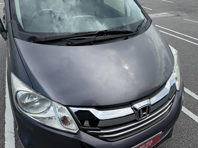 フリード Ｇ　プレミアムエディション　地デジＴＶ　盗難防止　ワンオーナー車　Ｄレコ　ＶＳＡ　電動格納ドアミラー　Ｂカメラ　ウォークスルー　オートクルーズ　キーレスキー　禁煙　パワステ　ＡＡＣ　ＥＴＣ車載器　パワーウィンド　ＡＢＳ　ＢＴ接続（9枚目）