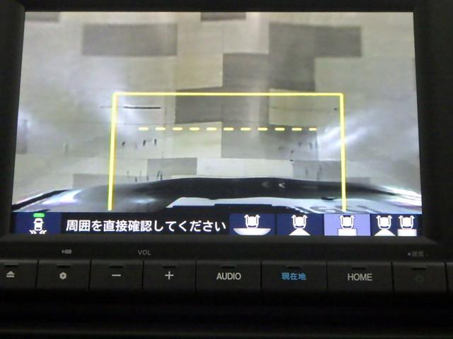 フィット ｅ：ＨＥＶホーム　禁煙車　前後誤発進抑制機能　クリソナ　助手席エアバッグ　運転席エアバッグ　１オナ　アイドリングストップ　ＬＥＤライト　ＵＳＢ接続　バックカメラ　ＡＢＳ　サイドエアバッグ　オートクルーズコントロール（3枚目）