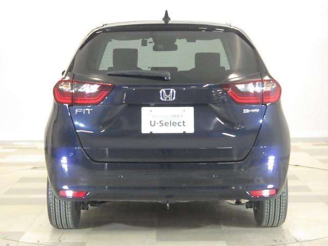 フィット ｅ：ＨＥＶホーム　禁煙車　前後誤発進抑制機能　クリソナ　助手席エアバッグ　運転席エアバッグ　１オナ　アイドリングストップ　ＬＥＤライト　ＵＳＢ接続　バックカメラ　ＡＢＳ　サイドエアバッグ　オートクルーズコントロール（24枚目）