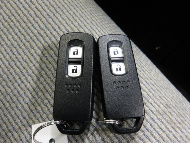 N-WGN Lホンダセンシング 禁煙車 ETC装備 Bモニタ 誤発進抑制 1オナ LEDランプ シートヒータ DVD フルセグ 横滑り防止機能 USBポート パーキングセンサー セキュリティアラーム キーフリー ナビTV ABS(15枚目)