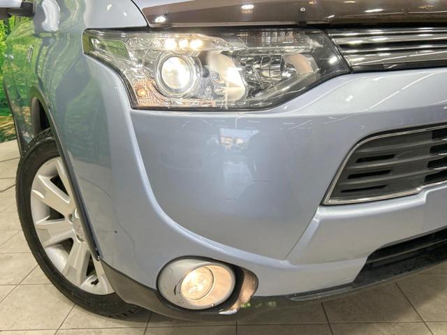 アウトランダーＰＨＥＶ Ｇセーフティパッケージ　純正ナビ　バックカメラ　衝突被害軽減　レーダークルーズ　車線逸脱警報　シートヒーター　半革シート　純正１８インチアルミ　ＨＩＤヘッド　ＥＴＣ　ＤＶＤ再生　スマートキー　アイドリングストップ（13枚目）