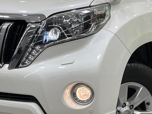 ランドクルーザープラド TX Lパッケージ・G-フロンティア 禁煙車 サンルーフ 純正SDナビ バックカメラ 寒冷地仕様 レザーシート コーナーセンサー スマートキー LEDヘッド 純正17インチアルミ ルーフレール ETC クルコン オートライト(13枚目)