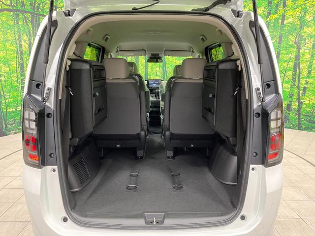 フリード エアー 登録済未使用車 純正ディスプレイオーディオ バックカメラ 両側電動ドア 6人乗り レーダークルーズ コーナーセンサー スマートキー LEDヘッド オートハイビーム 車線逸脱警報 オートライト(9枚目)