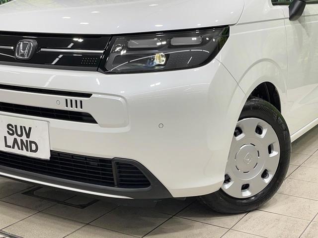 フリード エアー 登録済未使用車 純正ディスプレイオーディオ バックカメラ 両側電動ドア 6人乗り レーダークルーズ コーナーセンサー スマートキー LEDヘッド オートハイビーム 車線逸脱警報 オートライト(11枚目)