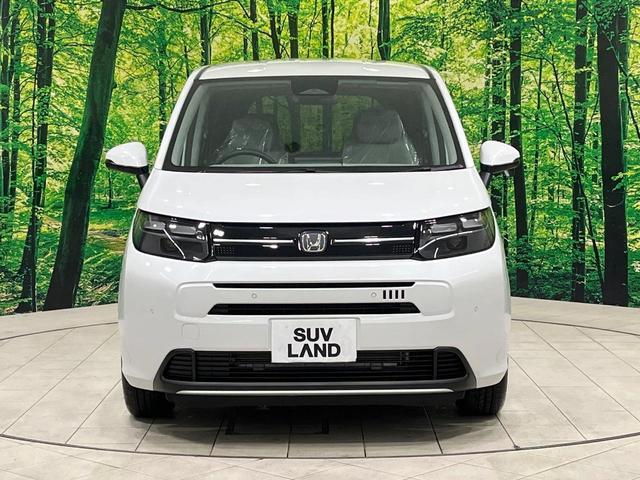 フリード エアー 登録済未使用車 純正ディスプレイオーディオ バックカメラ 両側電動ドア 6人乗り レーダークルーズ コーナーセンサー スマートキー LEDヘッド オートハイビーム 車線逸脱警報 オートライト(13枚目)