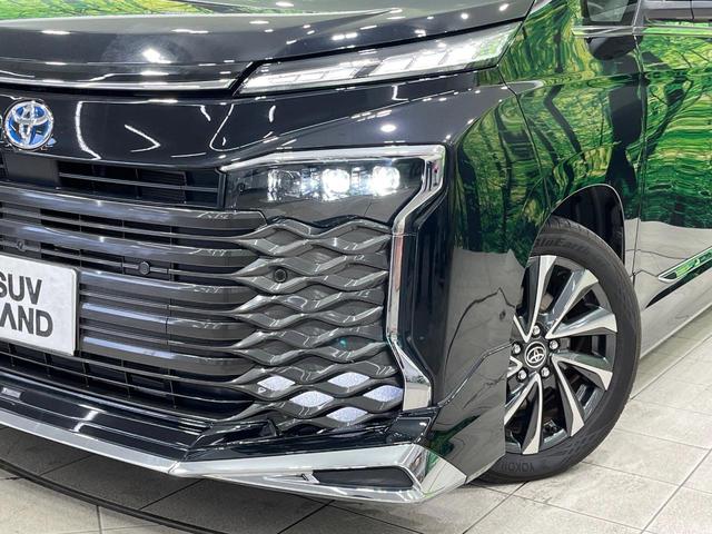 ヴォクシー ハイブリッドS-Z 禁煙車 モデリスタエアロ 後席モニター 快適利便PKG 全周囲カメラ 10型ナビ フルセグ 両側電動ドア アドバンスパーク デジタルミラー ブラインドスポットモニター HUD 3眼LEDライト(16枚目)