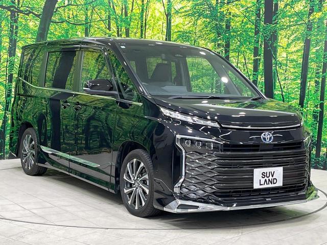 ヴォクシー ハイブリッドS-Z 禁煙車 モデリスタエアロ 後席モニター 快適利便PKG 全周囲カメラ 10型ナビ フルセグ 両側電動ドア アドバンスパーク デジタルミラー ブラインドスポットモニター HUD 3眼LEDライト(24枚目)