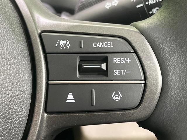 フリード e:HEVエアー EX 禁煙車 両側電動ドア 純正9型ナビ バックカメラ レーダークルーズ コーナーセンサー 純正15インチアルミ スマートキー LEDヘッド ビルトインETC オートハイビーム 車線逸脱警報 オートライト(5枚目)