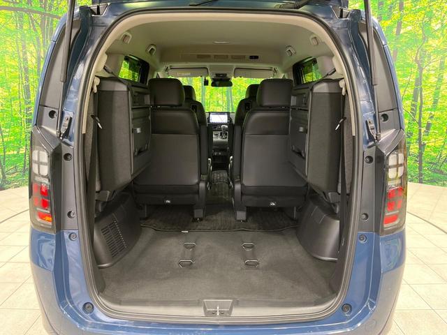 フリード e:HEVエアー EX 禁煙車 両側電動ドア 純正9型ナビ バックカメラ レーダークルーズ コーナーセンサー 純正15インチアルミ スマートキー LEDヘッド ビルトインETC オートハイビーム 車線逸脱警報 オートライト(11枚目)