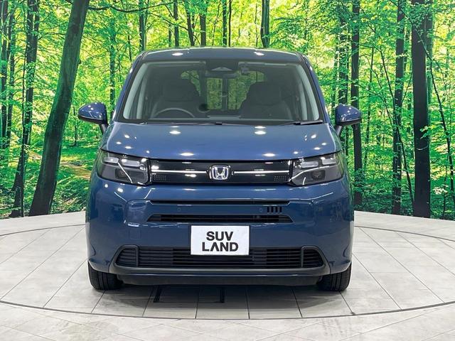 フリード e:HEVエアー EX 禁煙車 両側電動ドア 純正9型ナビ バックカメラ レーダークルーズ コーナーセンサー 純正15インチアルミ スマートキー LEDヘッド ビルトインETC オートハイビーム 車線逸脱警報 オートライト(15枚目)