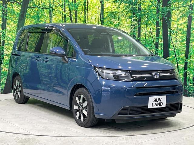 フリード e:HEVエアー EX 禁煙車 両側電動ドア 純正9型ナビ バックカメラ レーダークルーズ コーナーセンサー 純正15インチアルミ スマートキー LEDヘッド ビルトインETC オートハイビーム 車線逸脱警報 オートライト(17枚目)