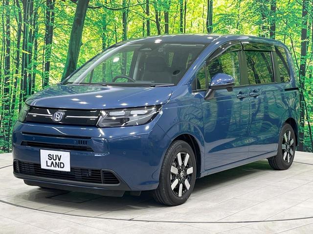 フリード e:HEVエアー EX 禁煙車 両側電動ドア 純正9型ナビ バックカメラ レーダークルーズ コーナーセンサー 純正15インチアルミ スマートキー LEDヘッド ビルトインETC オートハイビーム 車線逸脱警報 オートライト(25枚目)