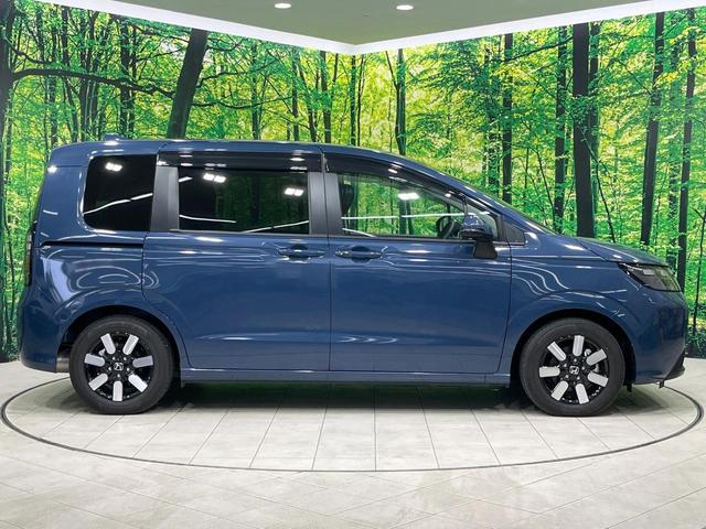 フリード e:HEVエアー EX 禁煙車 両側電動ドア 純正9型ナビ バックカメラ レーダークルーズ コーナーセンサー 純正15インチアルミ スマートキー LEDヘッド ビルトインETC オートハイビーム 車線逸脱警報 オートライト(26枚目)