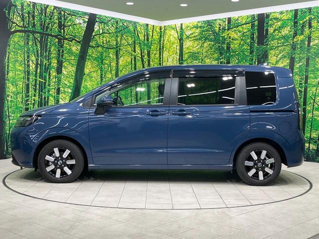 フリード e:HEVエアー EX 禁煙車 両側電動ドア 純正9型ナビ バックカメラ レーダークルーズ コーナーセンサー 純正15インチアルミ スマートキー LEDヘッド ビルトインETC オートハイビーム 車線逸脱警報 オートライト(28枚目)