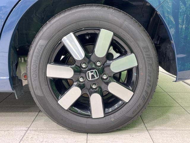 フリード e:HEVエアー EX 禁煙車 両側電動ドア 純正9型ナビ バックカメラ レーダークルーズ コーナーセンサー 純正15インチアルミ スマートキー LEDヘッド ビルトインETC オートハイビーム 車線逸脱警報 オートライト(29枚目)