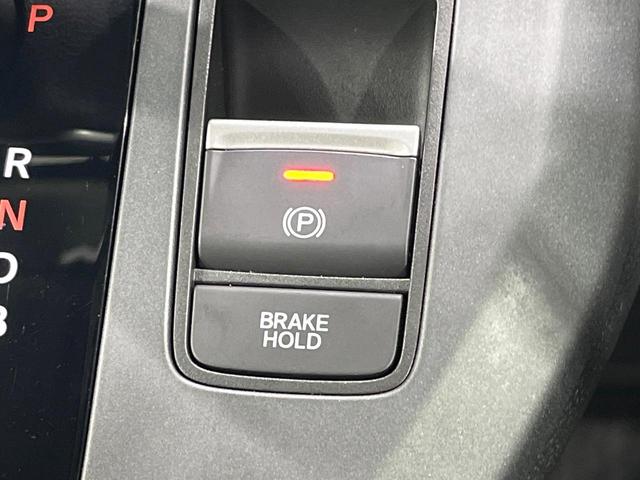 フリード e:HEVエアー EX 禁煙車 両側電動ドア 純正9型ナビ バックカメラ レーダークルーズ コーナーセンサー 純正15インチアルミ スマートキー LEDヘッド ビルトインETC オートハイビーム 車線逸脱警報 オートライト(36枚目)