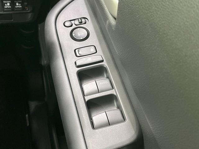 フリード e:HEVエアー EX 禁煙車 両側電動ドア 純正9型ナビ バックカメラ レーダークルーズ コーナーセンサー 純正15インチアルミ スマートキー LEDヘッド ビルトインETC オートハイビーム 車線逸脱警報 オートライト(45枚目)