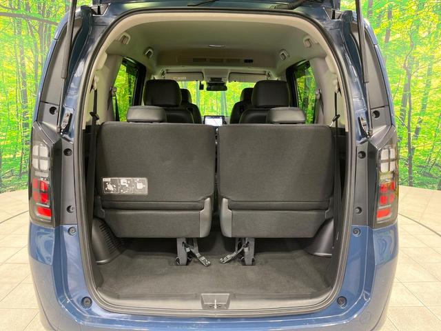 フリード e:HEVエアー EX 禁煙車 両側電動ドア 純正9型ナビ バックカメラ レーダークルーズ コーナーセンサー 純正15インチアルミ スマートキー LEDヘッド ビルトインETC オートハイビーム 車線逸脱警報 オートライト(49枚目)