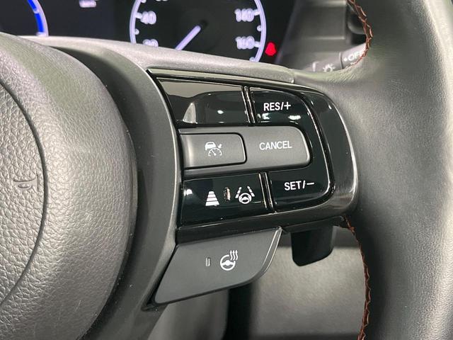 ヴェゼル ｅ：ＨＥＶ　ＰＬａＹ　禁煙車　サンルーフ　純正９型ナビ　全周囲カメラ　フルセグ　電動リアゲート　ホンダセンシング　レーダークルーズ　ブラインドスポットモニター　シートヒーター　ＥＴＣ　ＬＥＤライト　純正ＡＷ（7枚目）