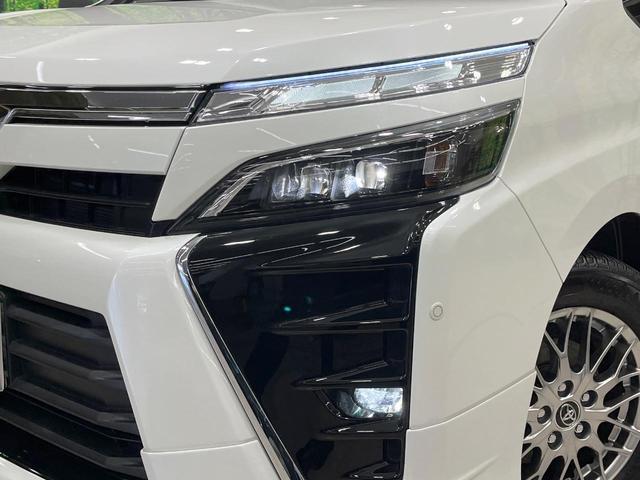 ヴォクシー ハイブリッドZS 煌 禁煙車 モデリスタエアロ 後席モニター BIG-X11型ナビ バックカメラ 両側電動ドア コーナーセンサー クルーズコントロール シートヒーター 寒冷地仕様 スマートキー LEDヘッド ETC(14枚目)