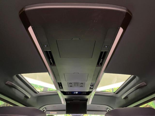 ヴェルファイアハイブリッド Z プレミア 禁煙車 左右独立ムーンルーフ フリップダウンモニター メーカー14型ナビ 全周囲カメラ チームメイト ブラインドスポットモニター デジタルインナーミラー 100V電源 パワーバックドア ETC(34枚目)