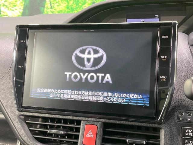 エスクァイア ハイブリッドＧｉ　ブラックテーラード　禁煙車　後席モニター　純正９型ナビ　両側電動ドア　シートヒーター　衝突被害軽減　コーナーセンサー　ＬＥＤヘッド　ＥＴＣ　クルコン　純正１５インチアルミ　オートハイビーム　スマートキー（4枚目）